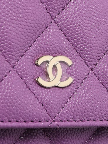 CHANEL
Purple Quilted Caviar Leather