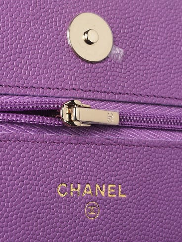 CHANEL
Purple Quilted Caviar Leather