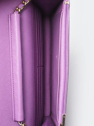 CHANEL
Purple Quilted Caviar Leather