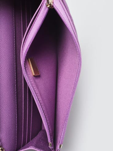 CHANEL
Purple Quilted Caviar Leather