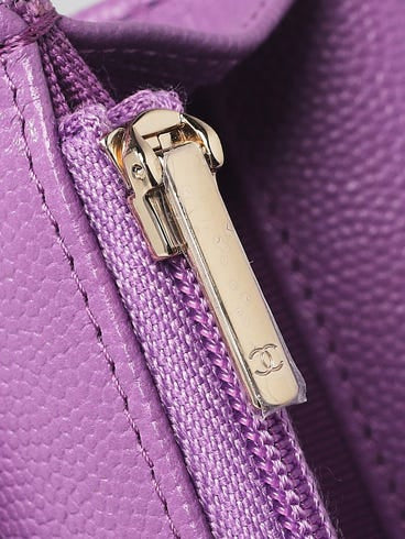 CHANEL
Purple Quilted Caviar Leather