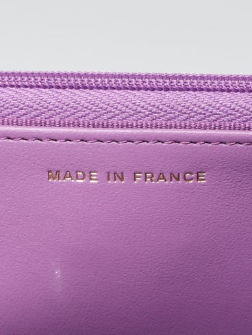 CHANEL
Purple Quilted Caviar Leather