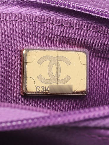 CHANEL
Purple Quilted Caviar Leather